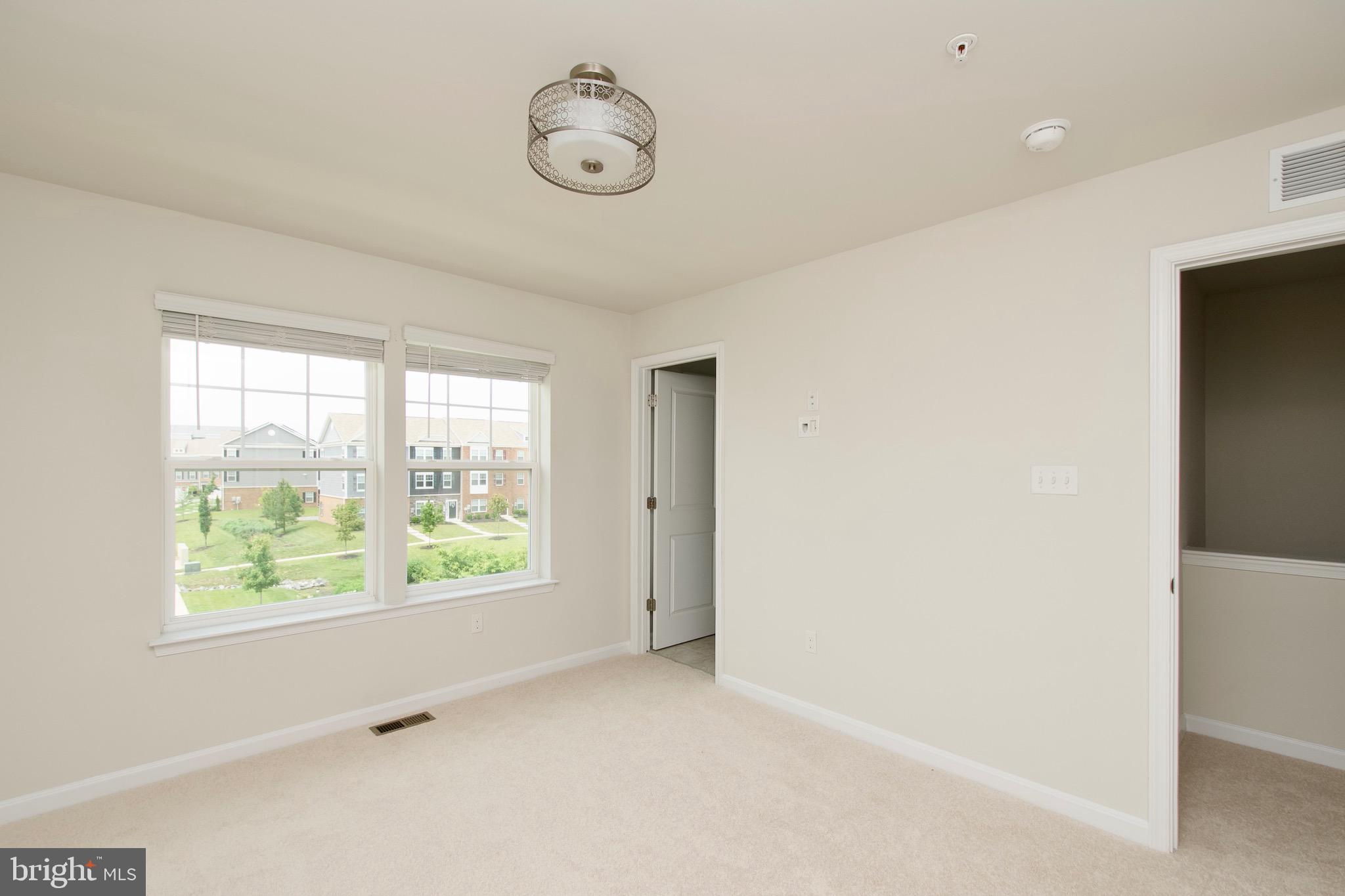 2023 Cross Church Way Bowie, MD 20721 - Photo 24 of 30 an empty room with windows