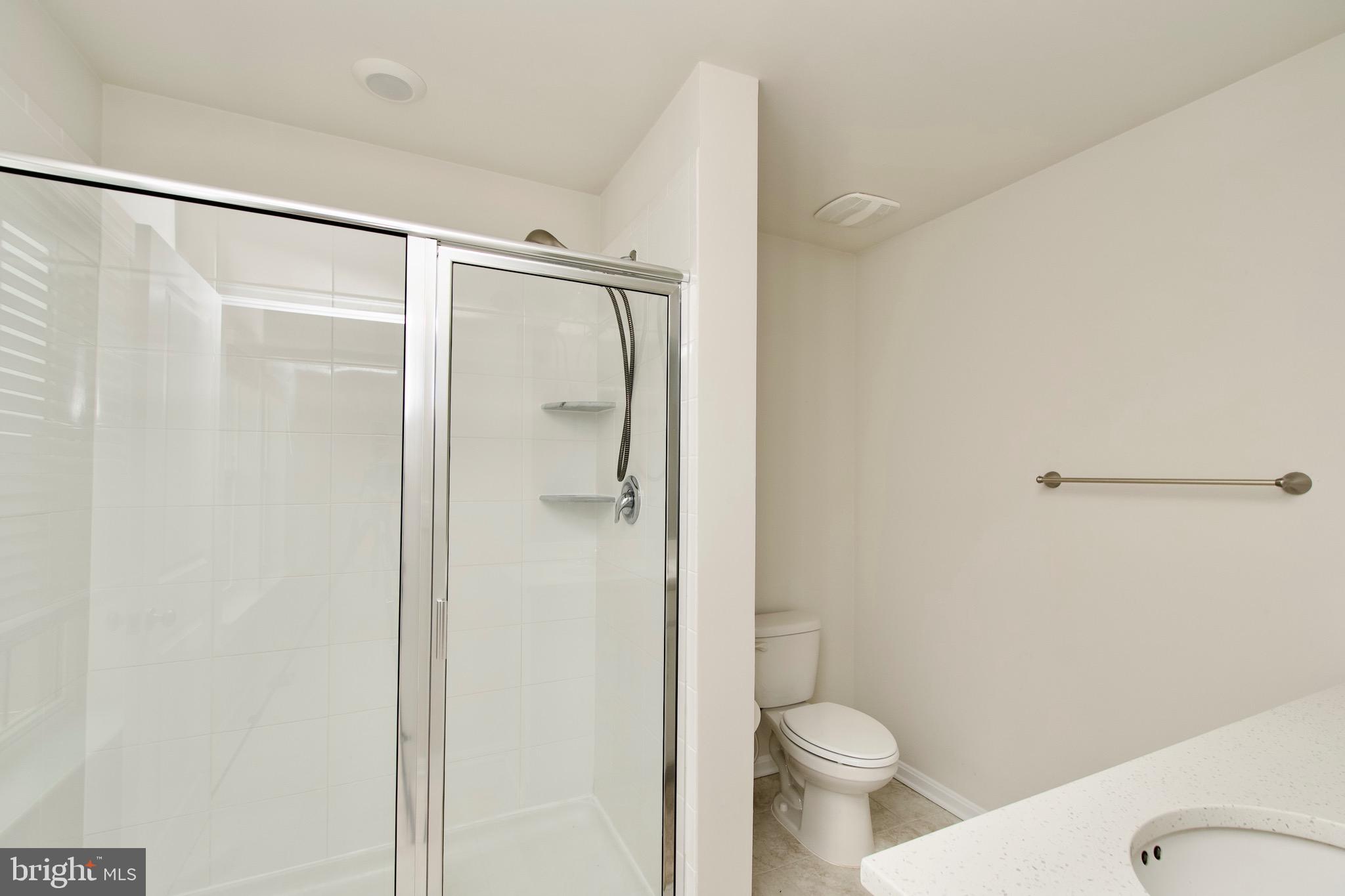 2023 Cross Church Way Bowie, MD 20721 - Photo 26 of 30 a bathroom with a toilet and a shower