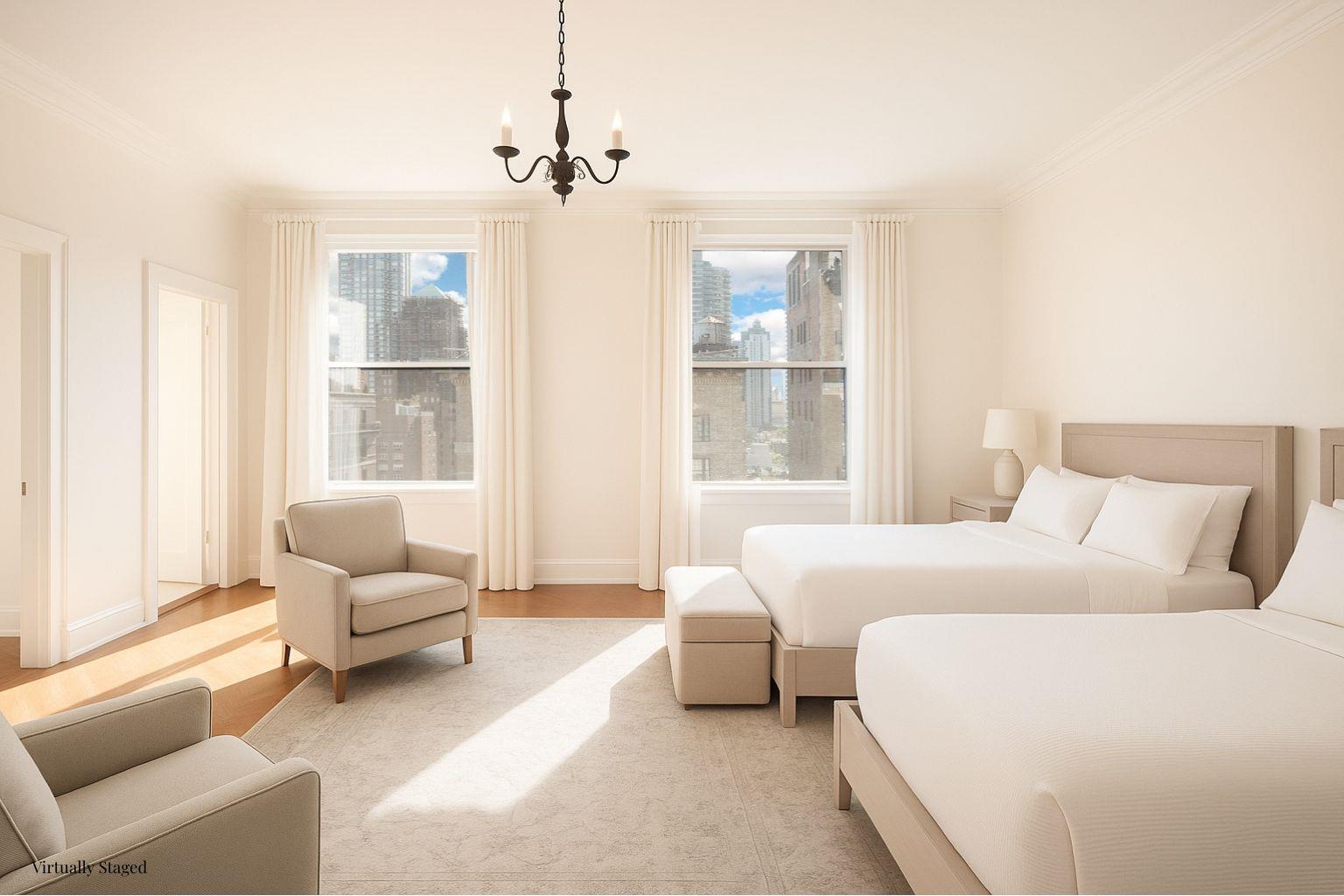 550 Park Avenue, Unit 12E Manhattan, NY 10065 - Photo 12 of 29 a bedroom with a bed and a couch next to a window