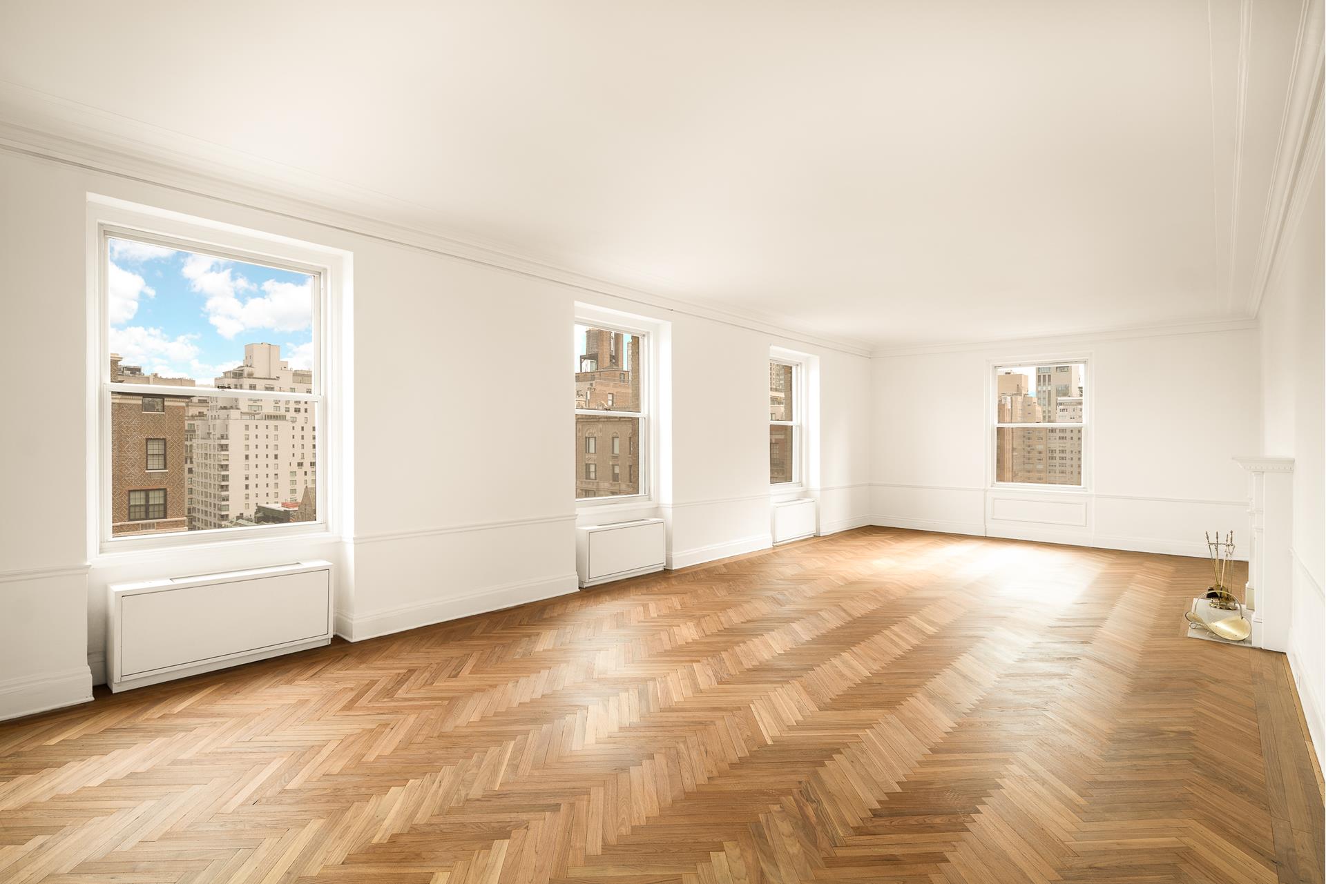 550 Park Avenue, Unit 12E Manhattan, NY 10065 - Photo 4 of 29 a view of an empty room with a window