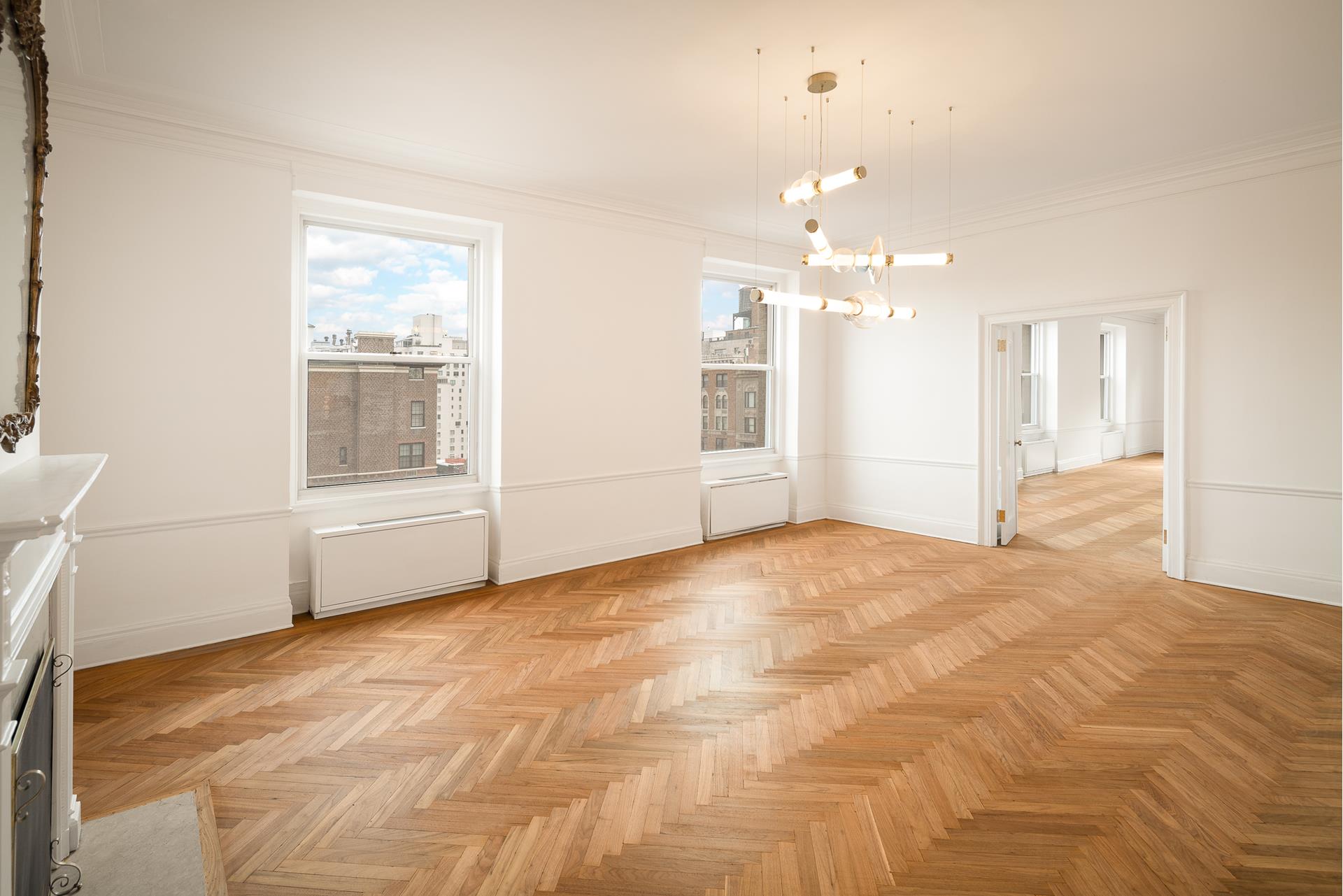 550 Park Avenue, Unit 12E Manhattan, NY 10065 - Photo 6 of 29 a view of an empty room with a window