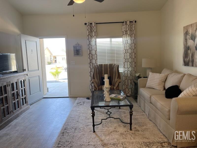 Undisclosed Address Bakersfield, CA 93314 - Photo 10 of 12 a living room with furniture and a window