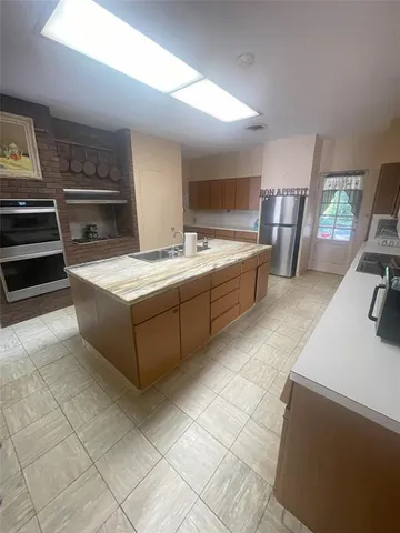 a living room with furniture and a rug