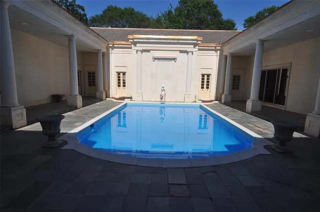 a view of living room with furniture and a flat screen tv