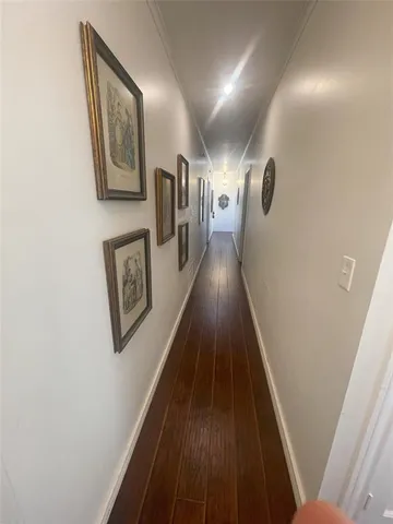 a bedroom with a bed lamp and a window