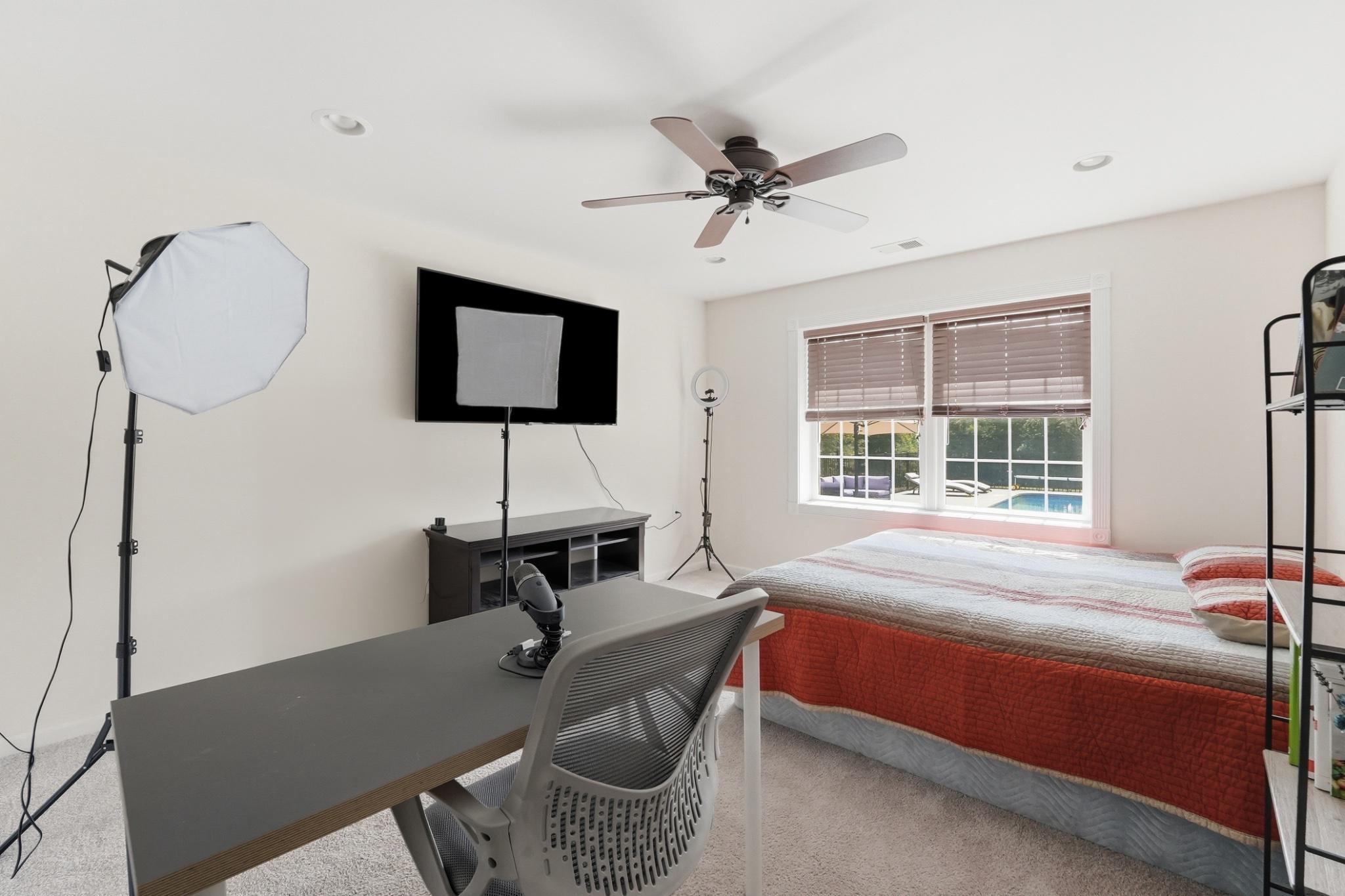 11337 Old Stillhouse Road Boston, VA 22713 - Photo 47 of 58 a living room with furniture a window and a ceiling fan