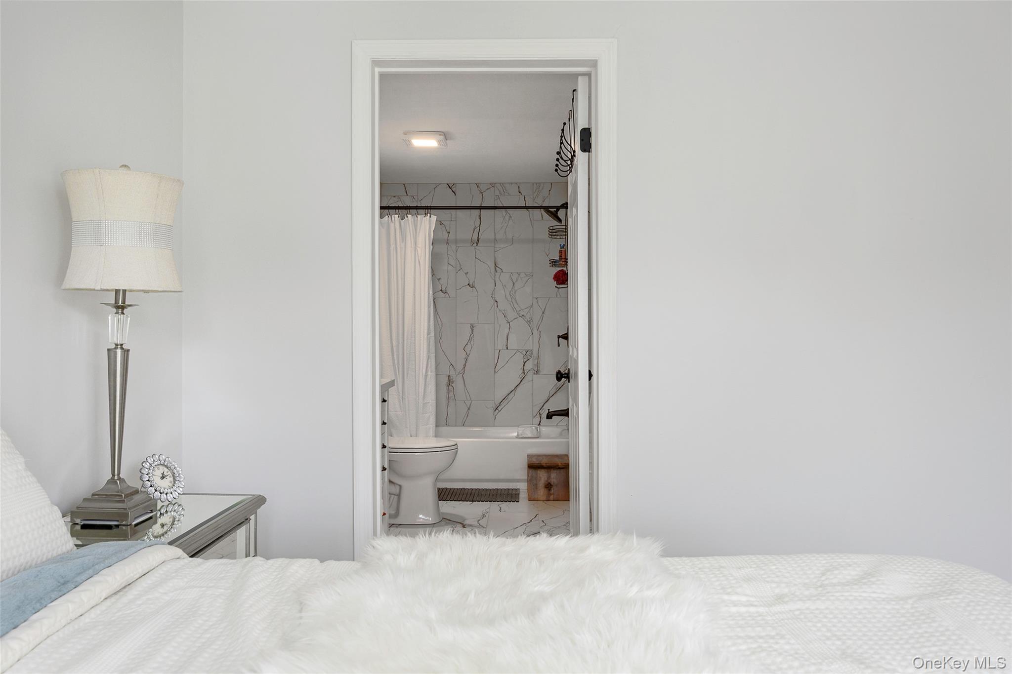 47 Clay Hill Road Tivoli, NY 12583 - Photo 15 of 43 a bathroom with a granite countertop sink and a mirror