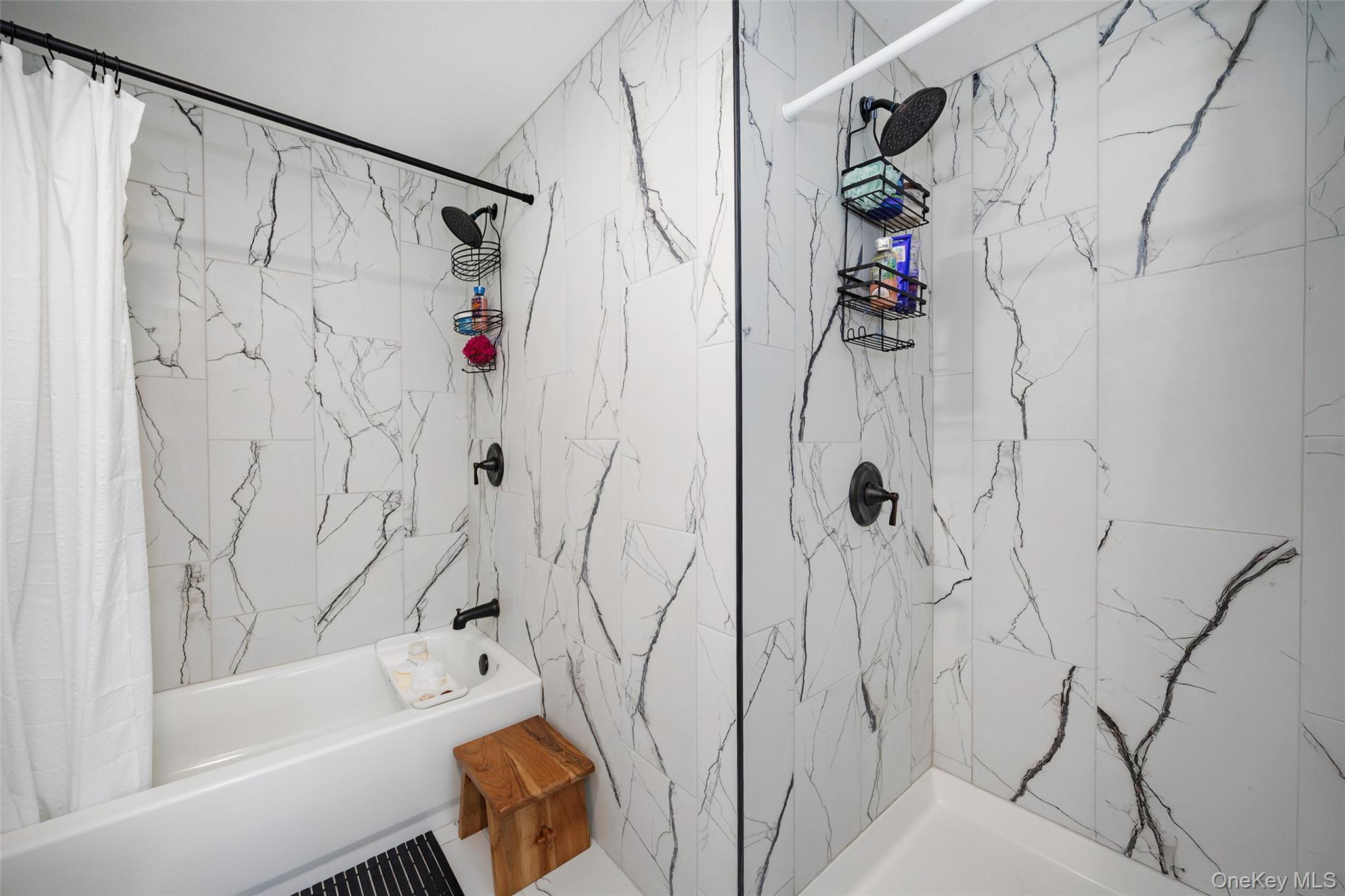 47 Clay Hill Road Tivoli, NY 12583 - Photo 17 of 43 a bathroom with a shower curtain and a bathtub