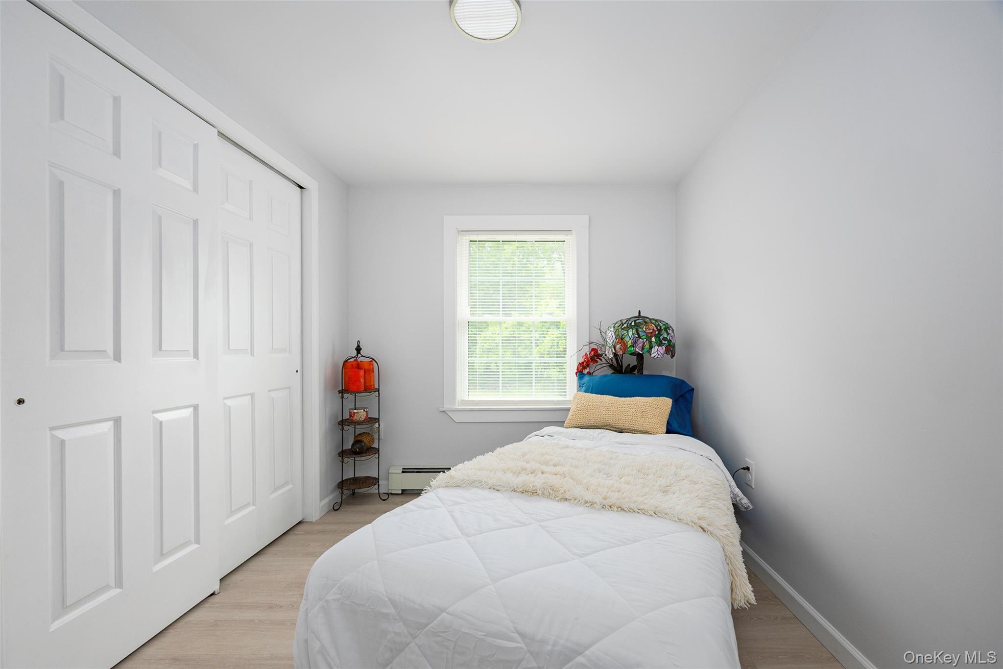 47 Clay Hill Road Tivoli, NY 12583 - Photo 20 of 43 a bed room with a bed and a window