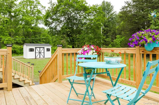 a view of a table and chairs in patio