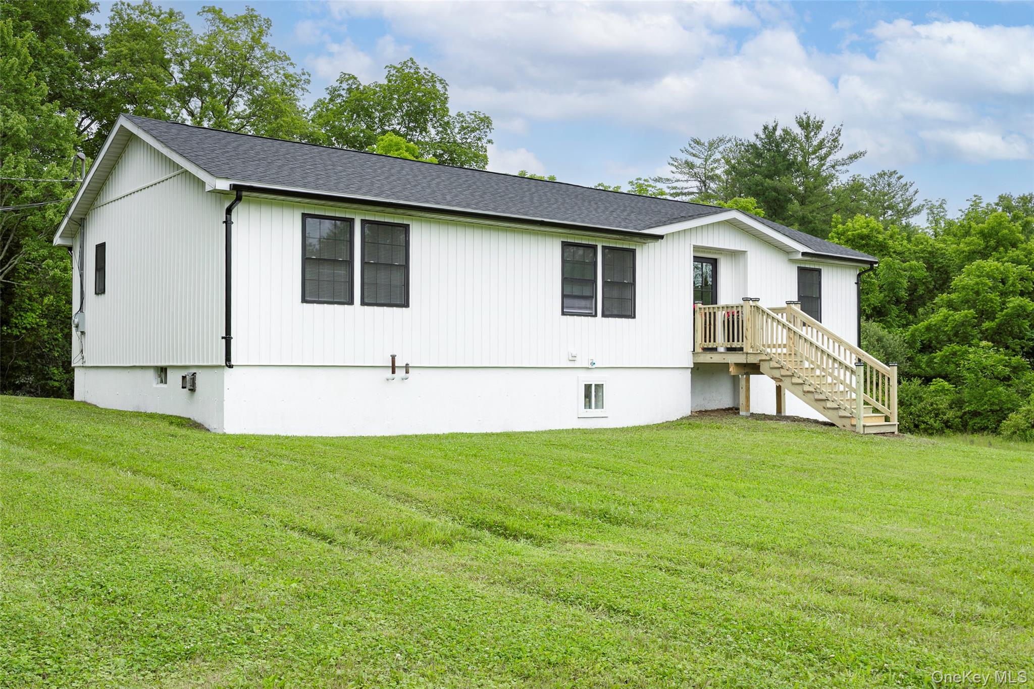 47 Clay Hill Road Tivoli, NY 12583 - Photo 40 of 43 a view of a backyard with plants and a garden