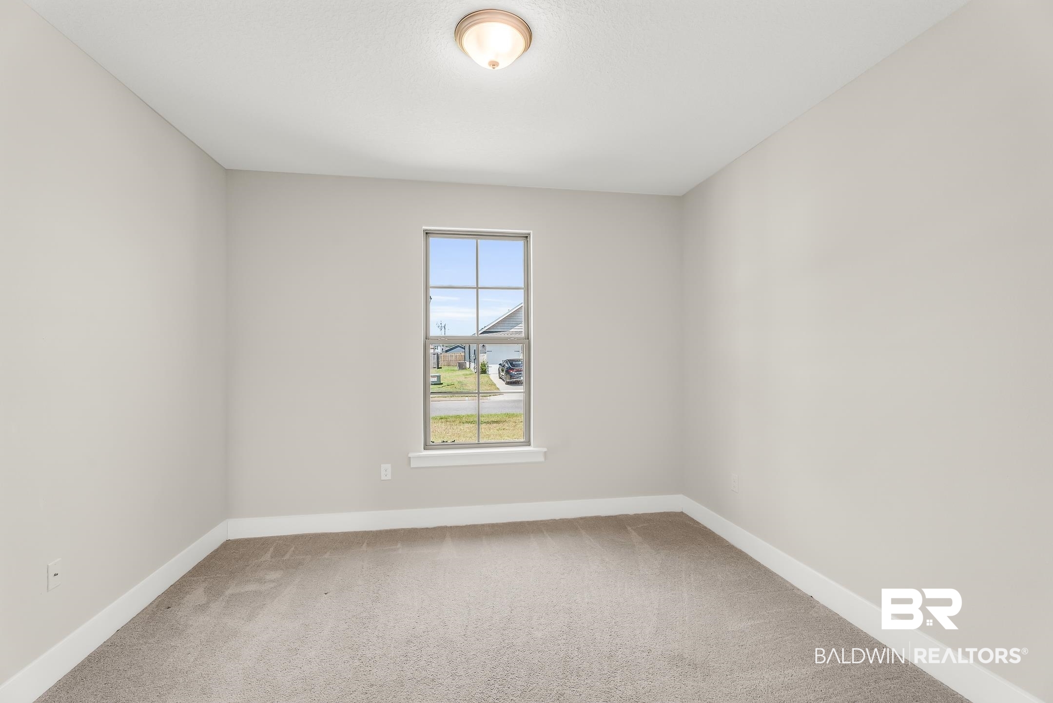 1720 Partridge Street Foley, AL 36535 - Photo 22 of 32 Bedroom 2 faces the street and shares a Jack & Jill bathroom with bedroom 3