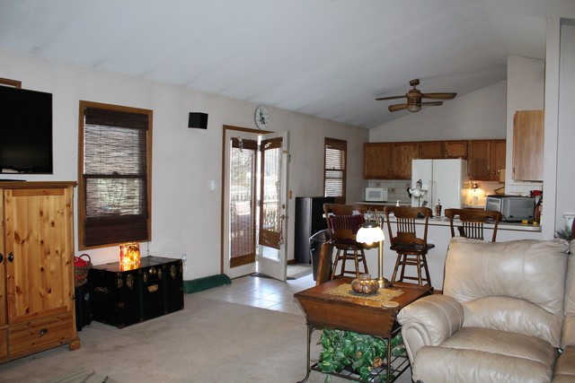 148 Fernwood Road Montgomery, IL 60538 - Photo 7 of 19 a living room with furniture and a flat screen tv