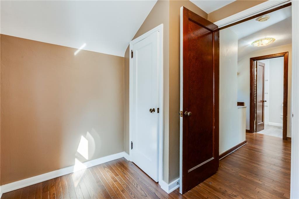 133 Hamburg Street Pittsburgh, PA 15220 - Photo 32 of 41 a view of hallway with wooden floor