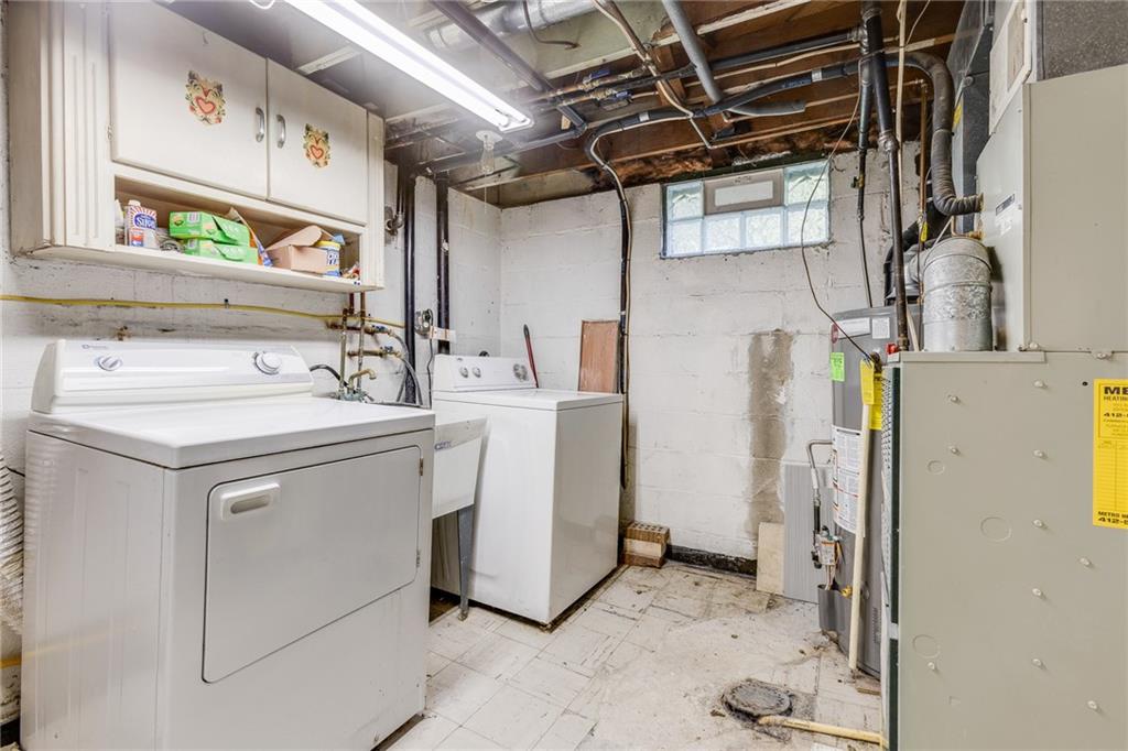 133 Hamburg Street Pittsburgh, PA 15220 - Photo 35 of 41 a utility room with dryer and washer