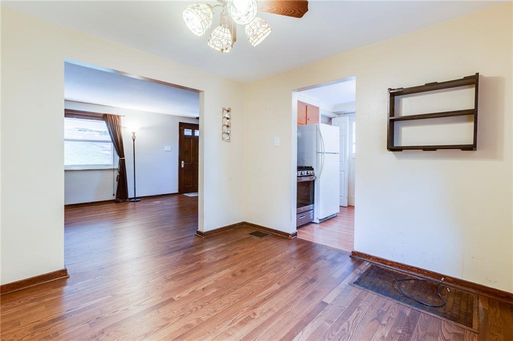 133 Hamburg Street Pittsburgh, PA 15220 - Photo 10 of 41 a view of a livingroom with wooden floor