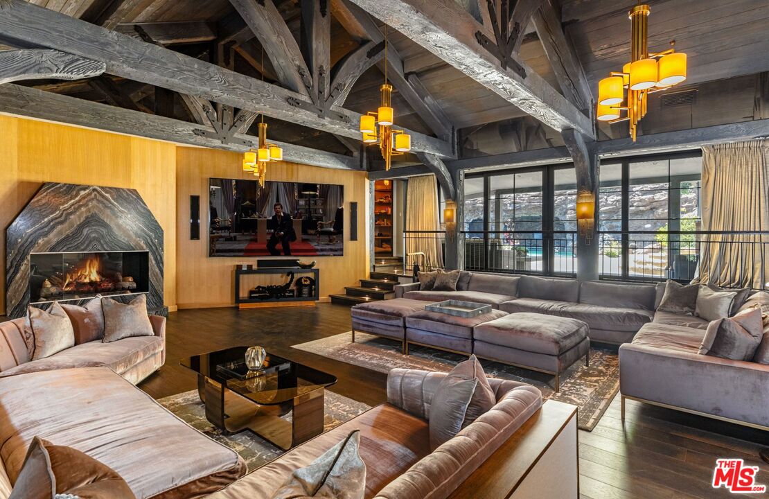 5841 Round Meadow Road Hidden Hills, CA 91302 - Photo 6 of 33 a outdoor living space with patio furniture and a fireplace