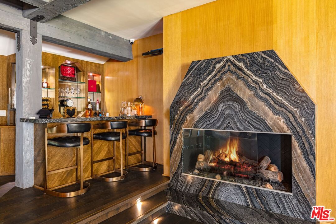 5841 Round Meadow Road Hidden Hills, CA 91302 - Photo 7 of 33 a view of living room with furniture and fireplace