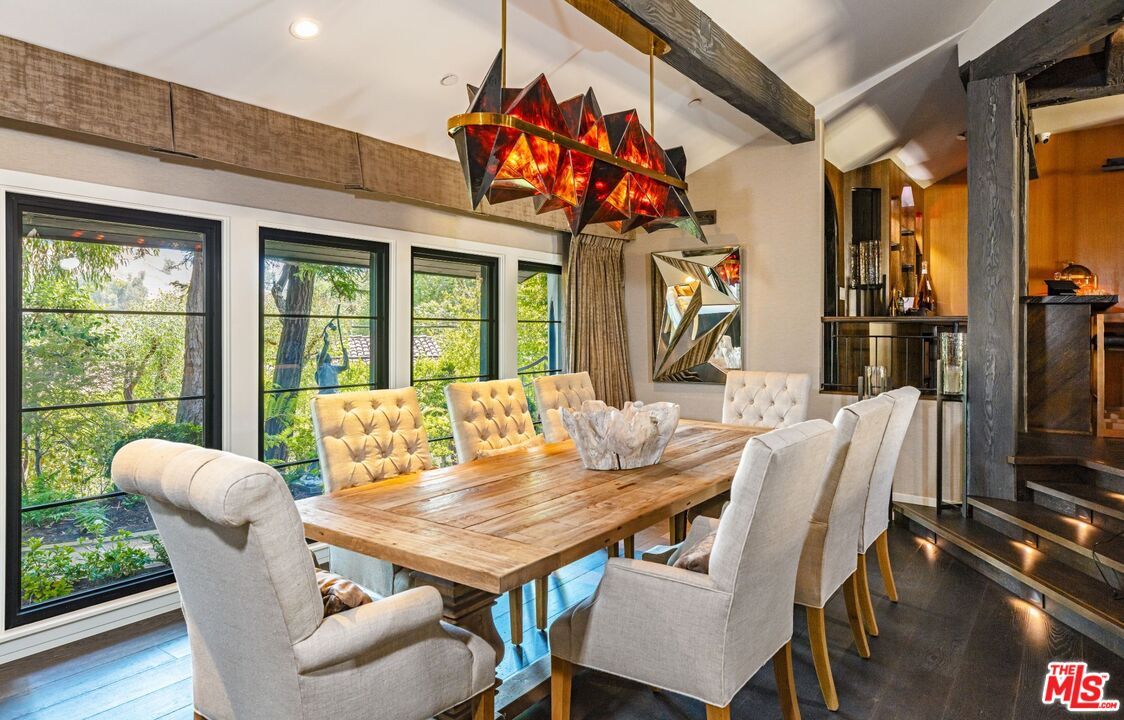 5841 Round Meadow Road Hidden Hills, CA 91302 - Photo 8 of 33 a view of a dining room with furniture window and outside view