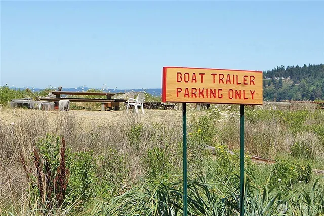a view of a sign board with lake view