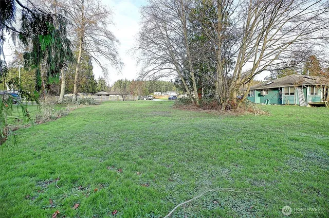 a view of a house with a big yard