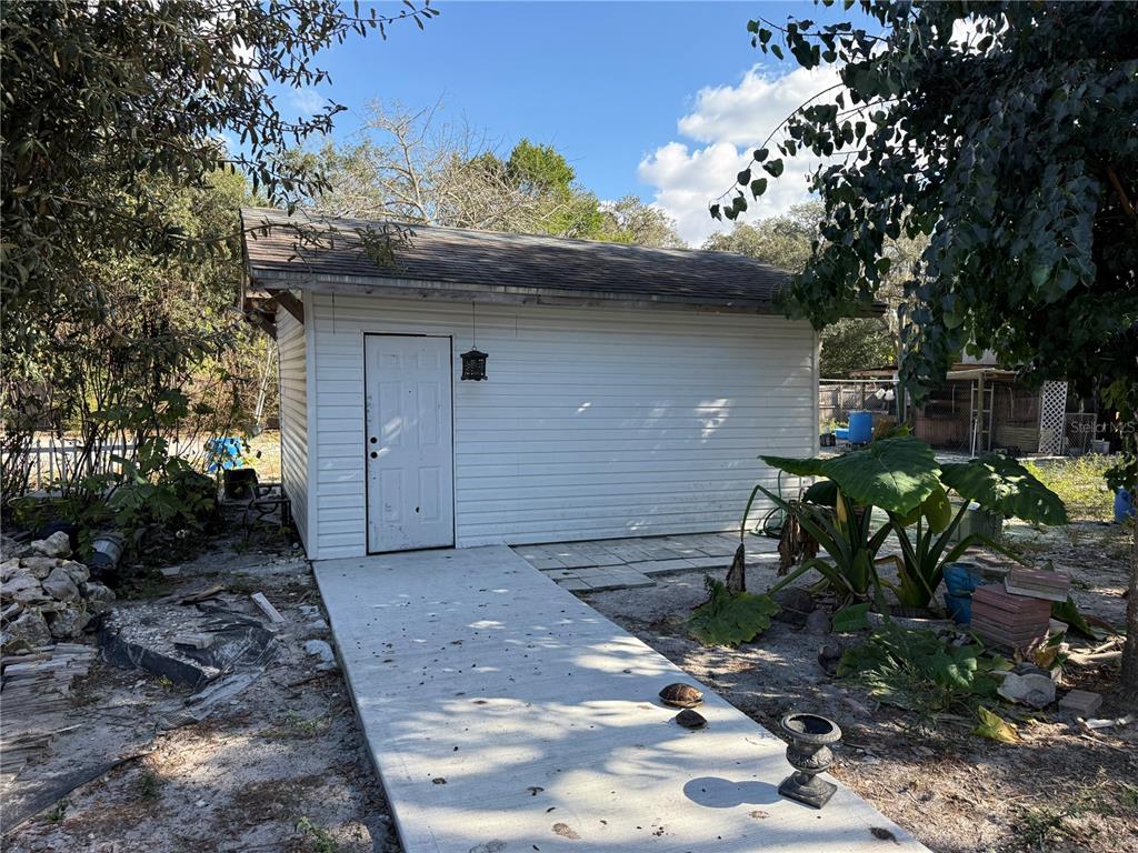 14208 Mayer Avenue Hudson, FL 34669 - Photo 24 of 29 a front view of a house with a yard