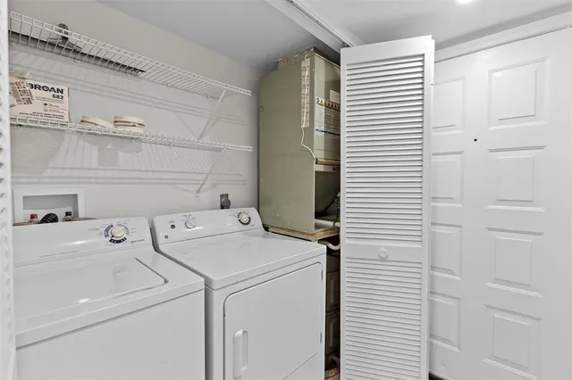 a view of a building with outdoor seating