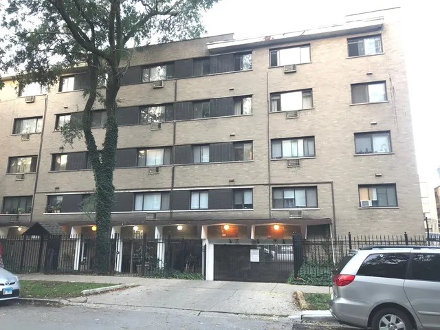 a view of a building and a street
