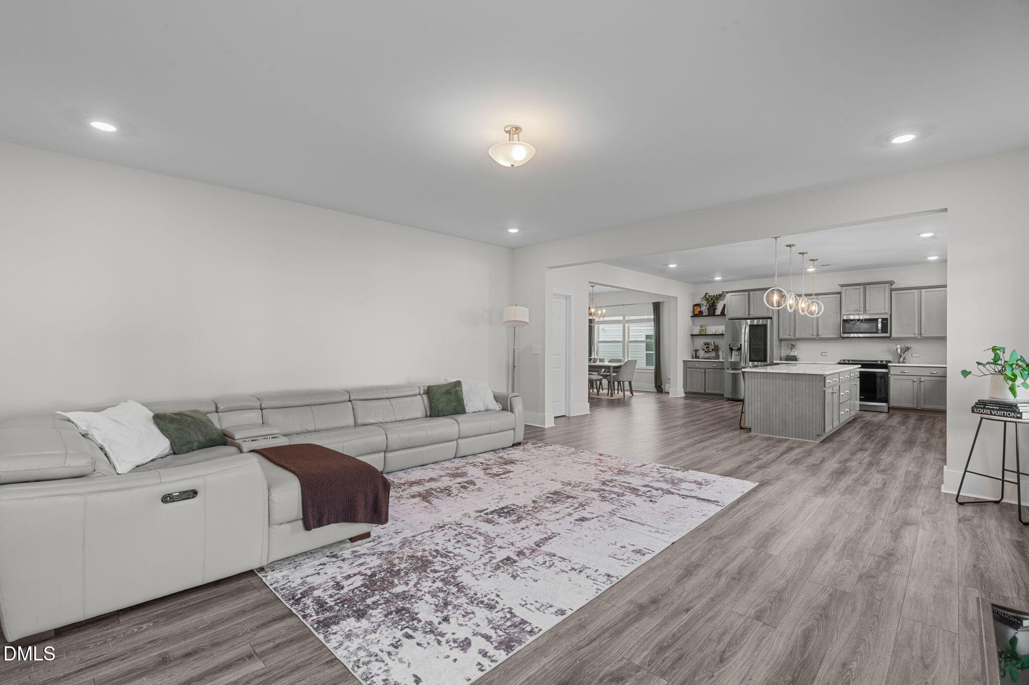 1400 Addison Lk Street Fuquay-Varina, NC 27526 - Photo 13 of 35 a living room with furniture and a wooden floor