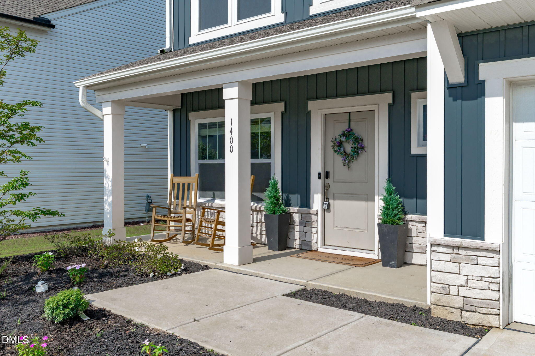 1400 Addison Lk Street Fuquay-Varina, NC 27526 - Photo 2 of 35 a front view of a house with a porch