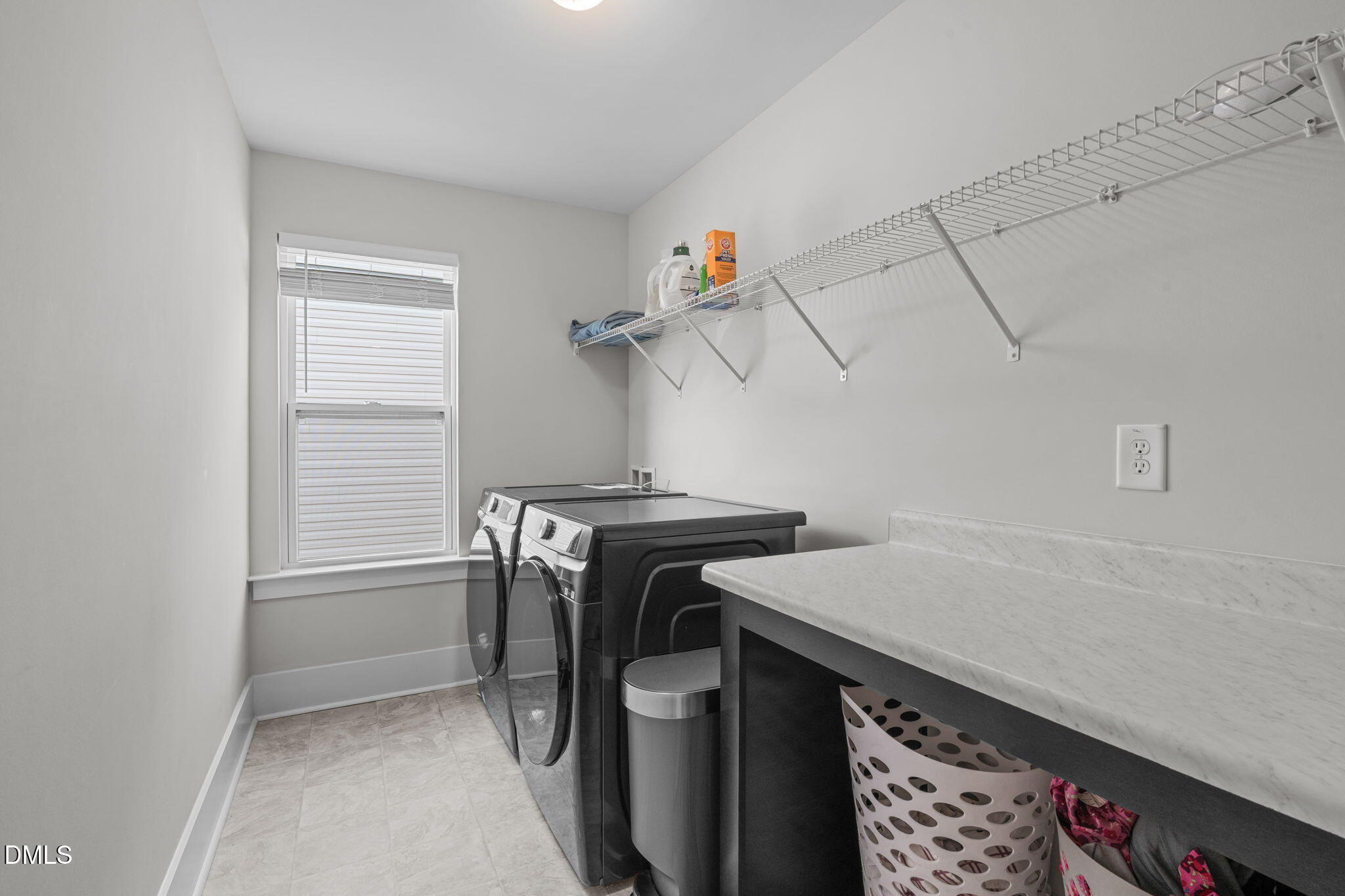 1400 Addison Lk Street Fuquay-Varina, NC 27526 - Photo 28 of 35 a utility room with cabinets washer and dryer