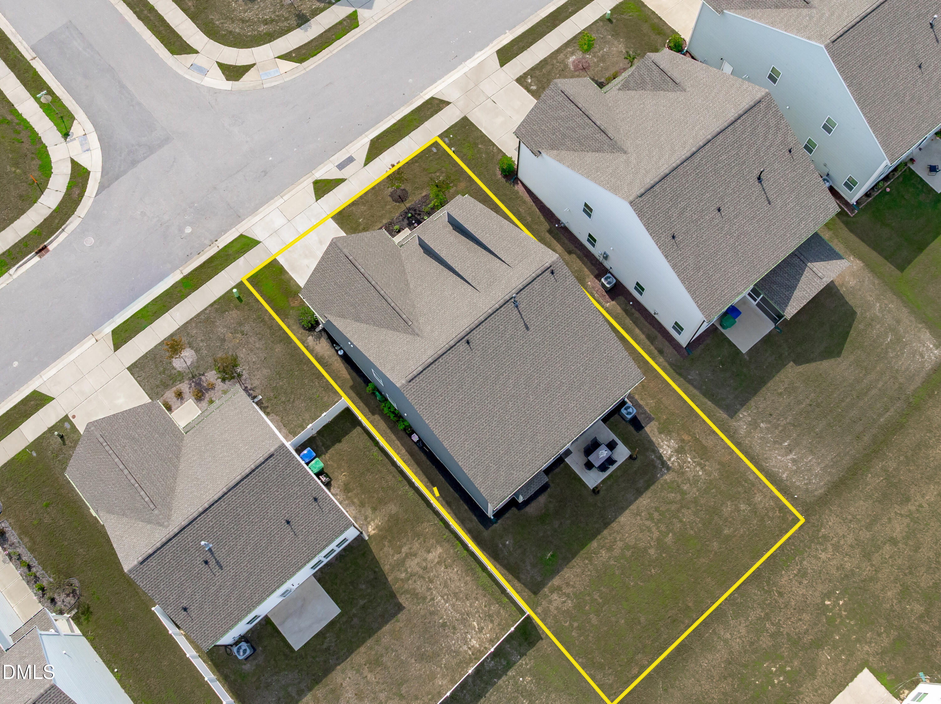 1400 Addison Lk Street Fuquay-Varina, NC 27526 - Photo 34 of 35 an aerial view of a house with a backyard