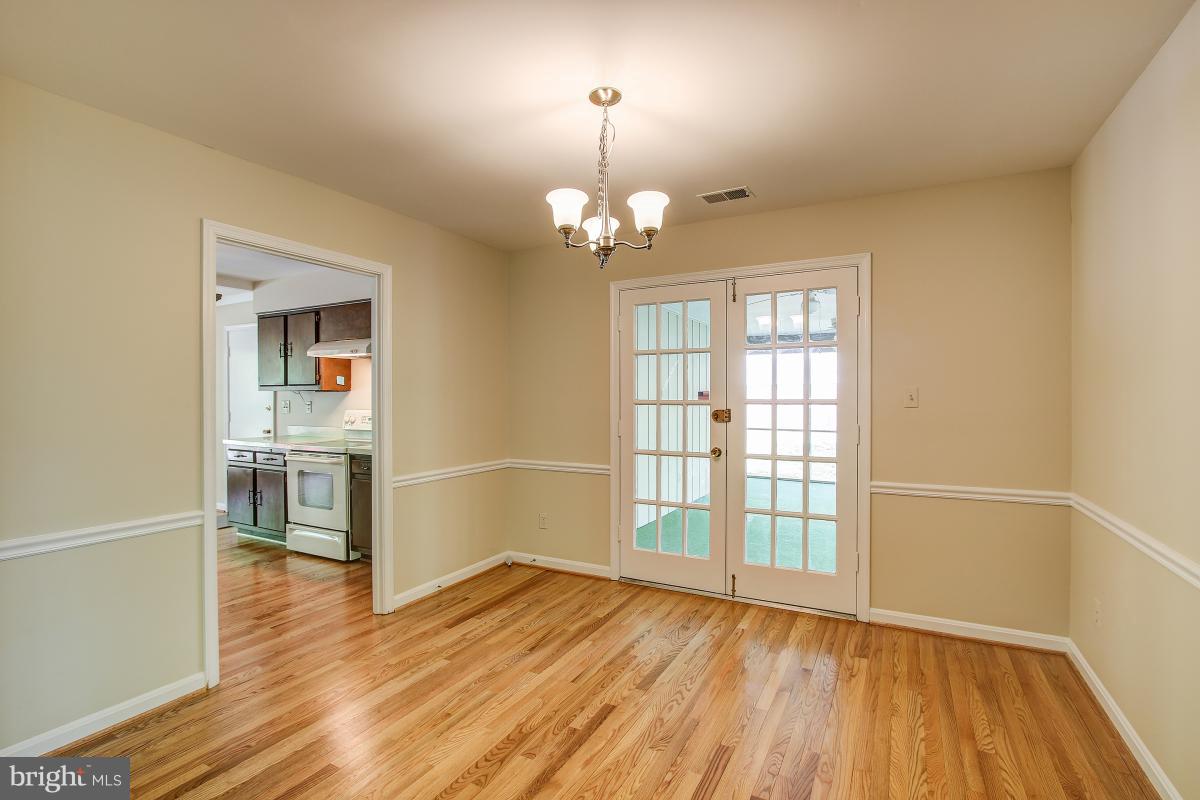 2409 Myrtle Lane Reston, VA 20191 - Photo 8 of 30 Dining Room opens to Screened Porch