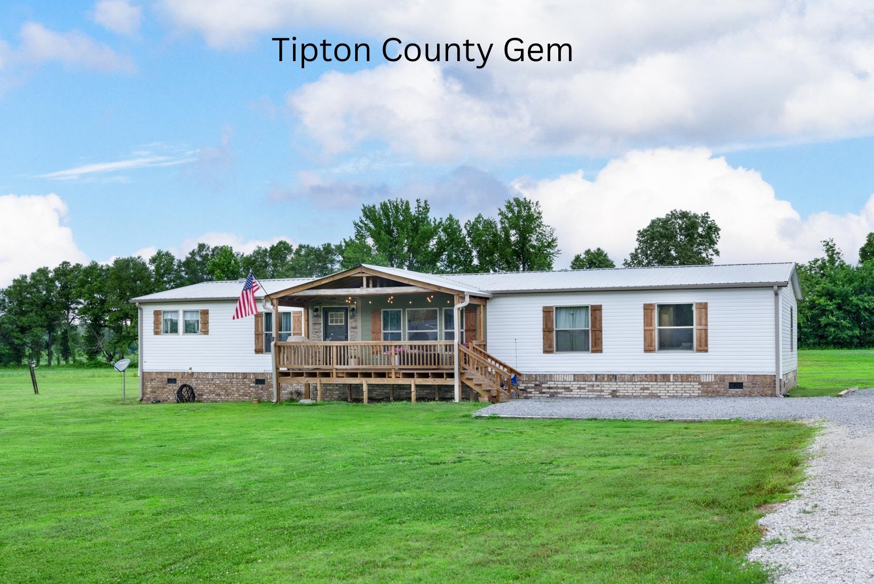 4044 Beaver Creek Road Mason, TN 38049 - Photo 1 of 36 Manufactured / mobile home with crawl space, a front lawn, metal roof, and covered porch