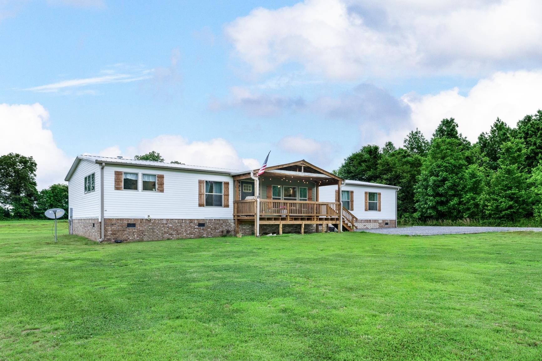 4044 Beaver Creek Road Mason, TN 38049 - Photo 2 of 36 Rear view of property with crawl space, a lawn, and a wooden deck