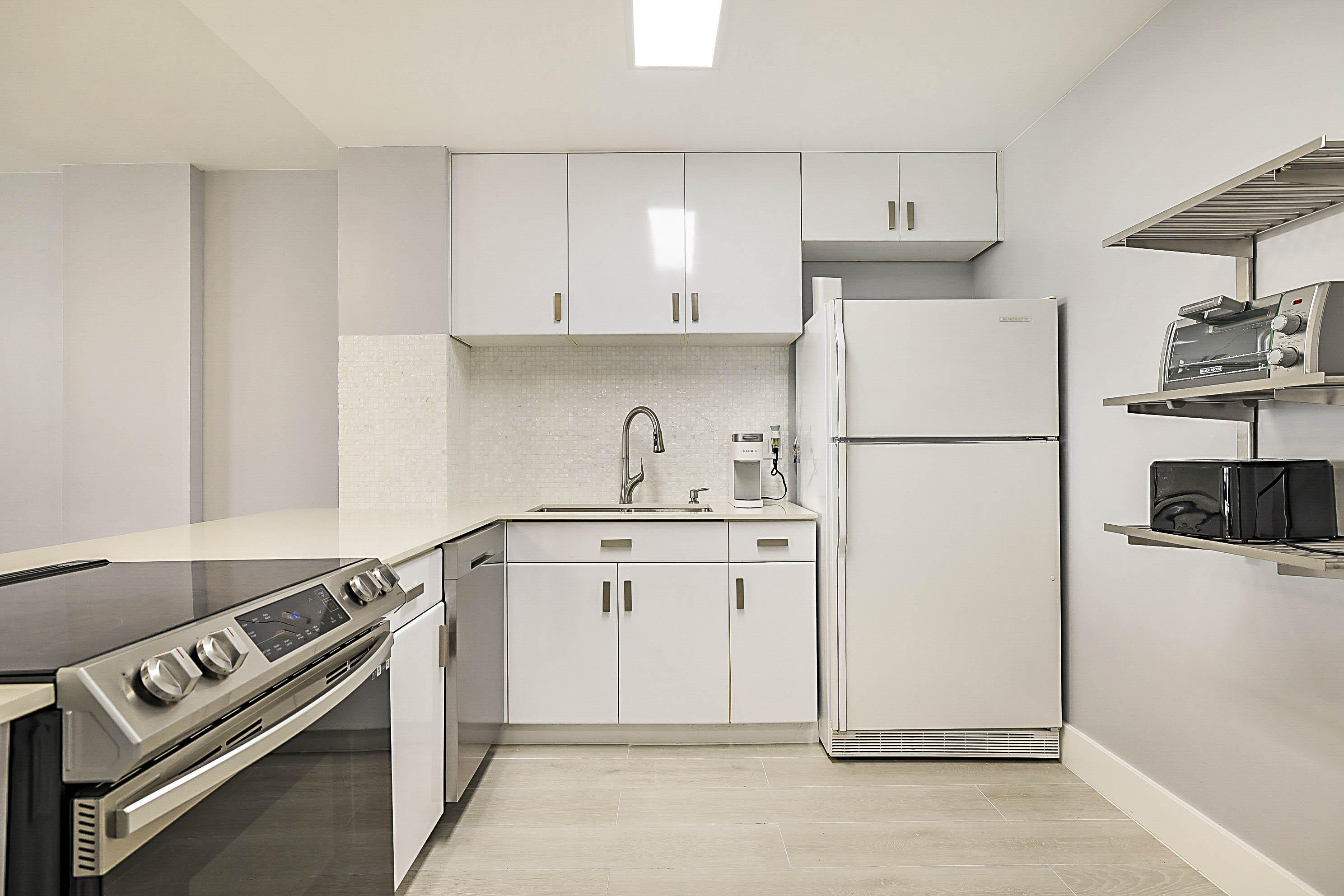 2121 North Ocean Boulevard, Unit 1103W Boca Raton, FL 33431 - Photo 16 of 55 Spacious kitchen