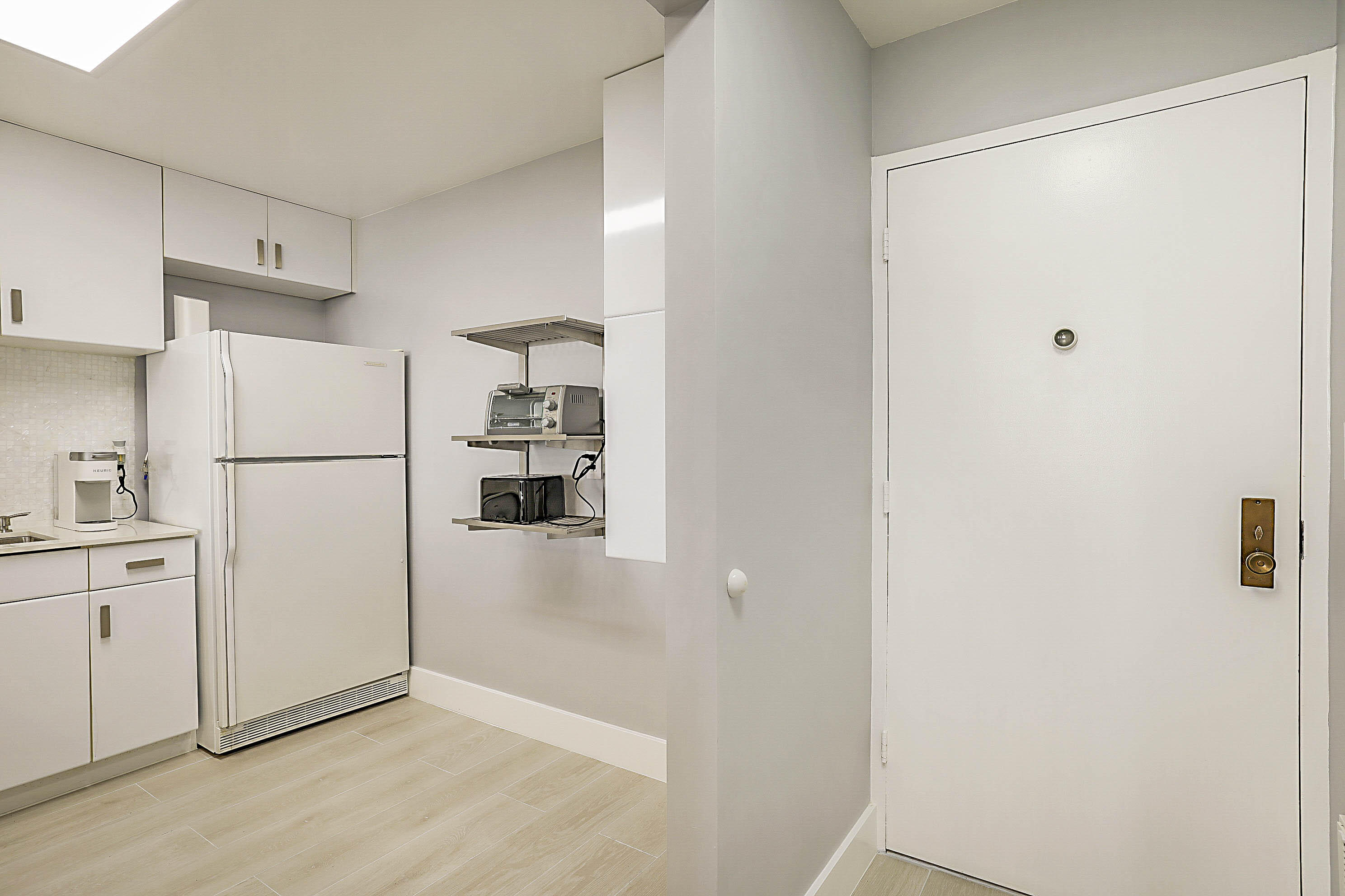 2121 North Ocean Boulevard, Unit 1103W Boca Raton, FL 33431 - Photo 19 of 55 Entrance to kitchen