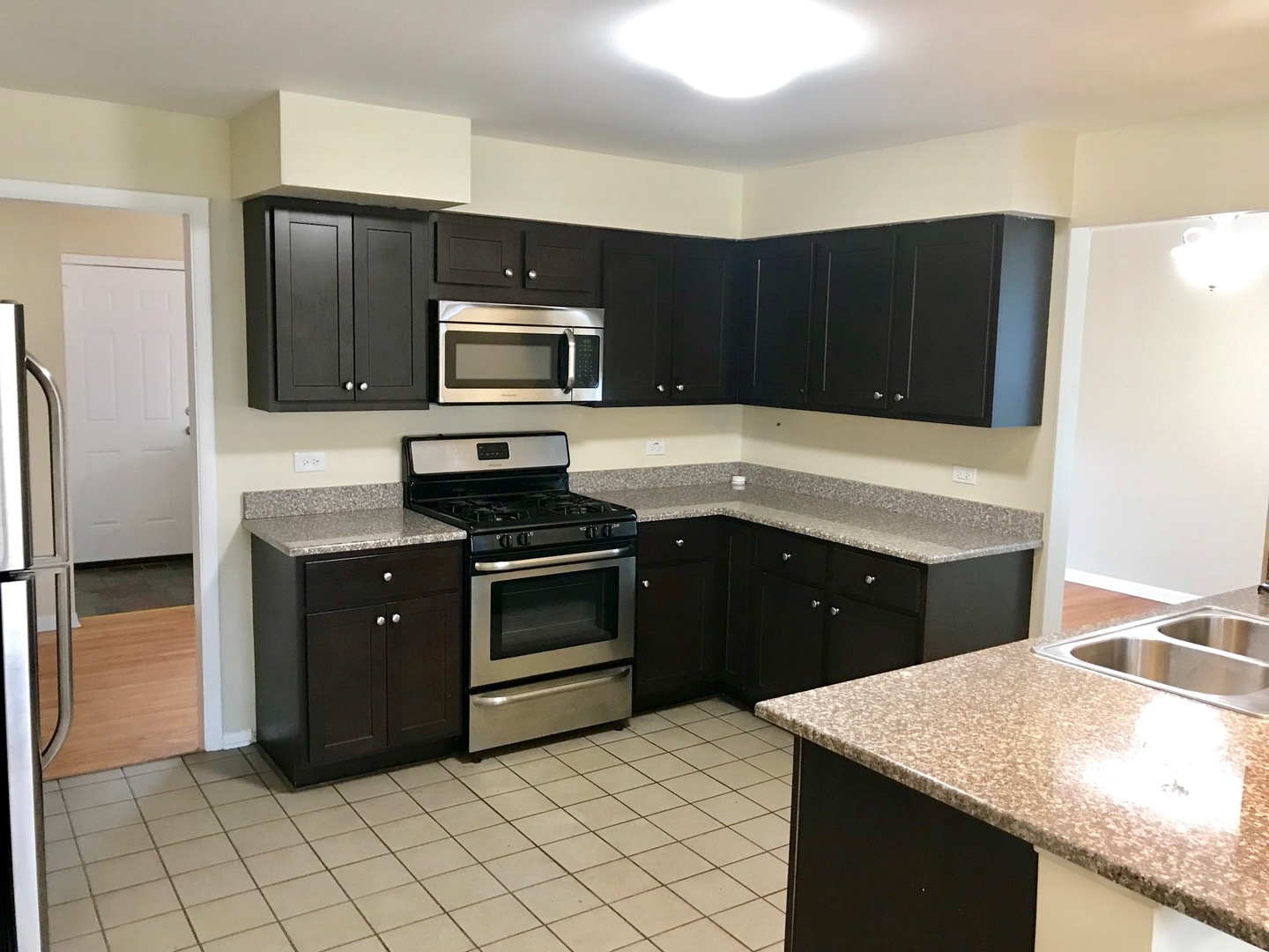 1223 Evergreen Road Homewood, IL 60430 - Photo 14 of 34 a kitchen with a sink and a stove top oven