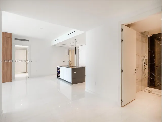 a view of a livingroom with a staircase