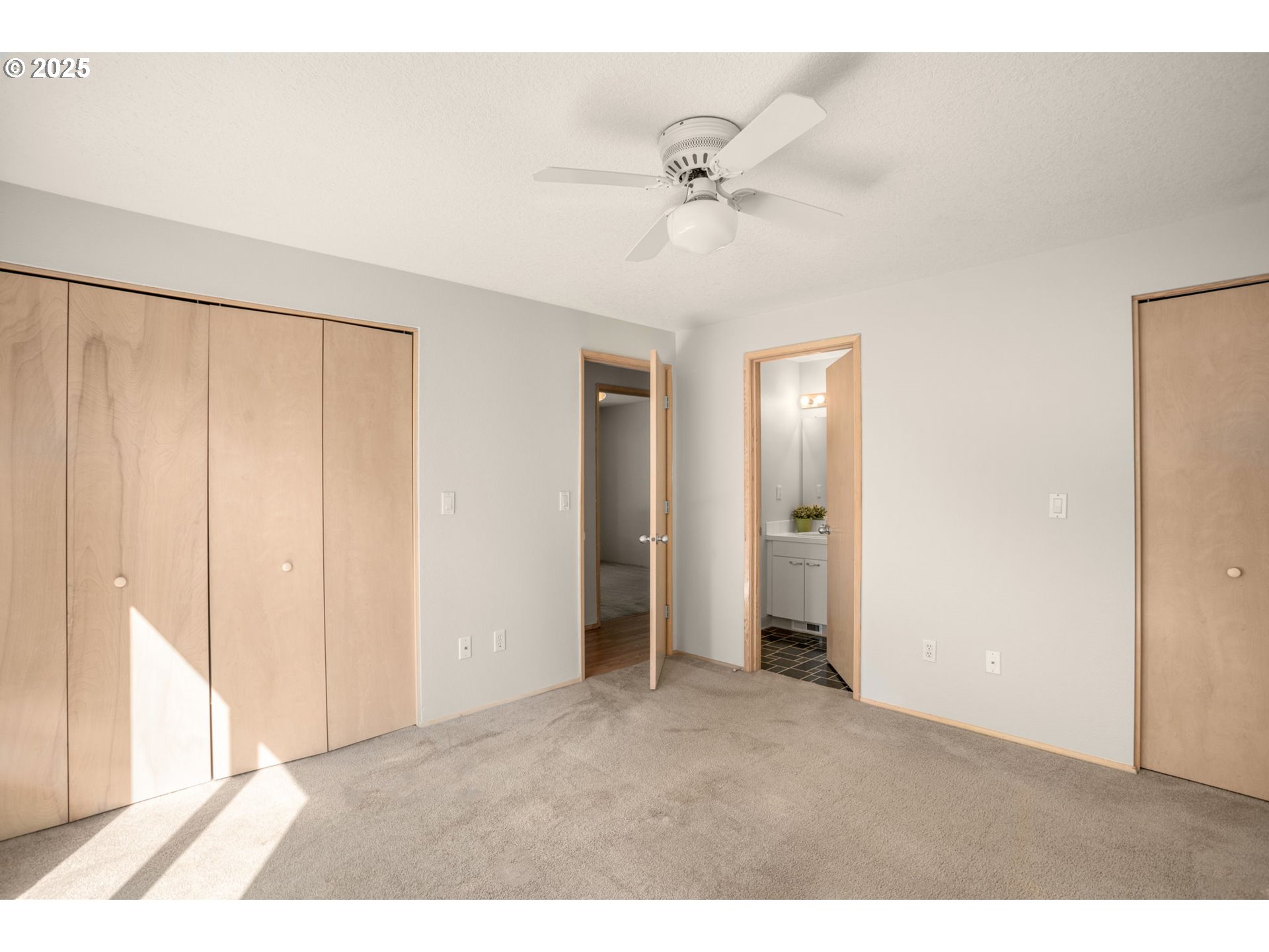 8123 Southwest Hearthside Court Portland, OR 97223 - Photo 12 of 19 a view of an empty room with closet and a window