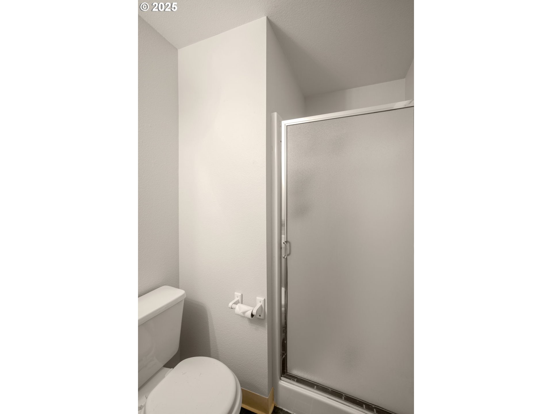 8123 Southwest Hearthside Court Portland, OR 97223 - Photo 14 of 19 a bathroom with a toilet and a shower