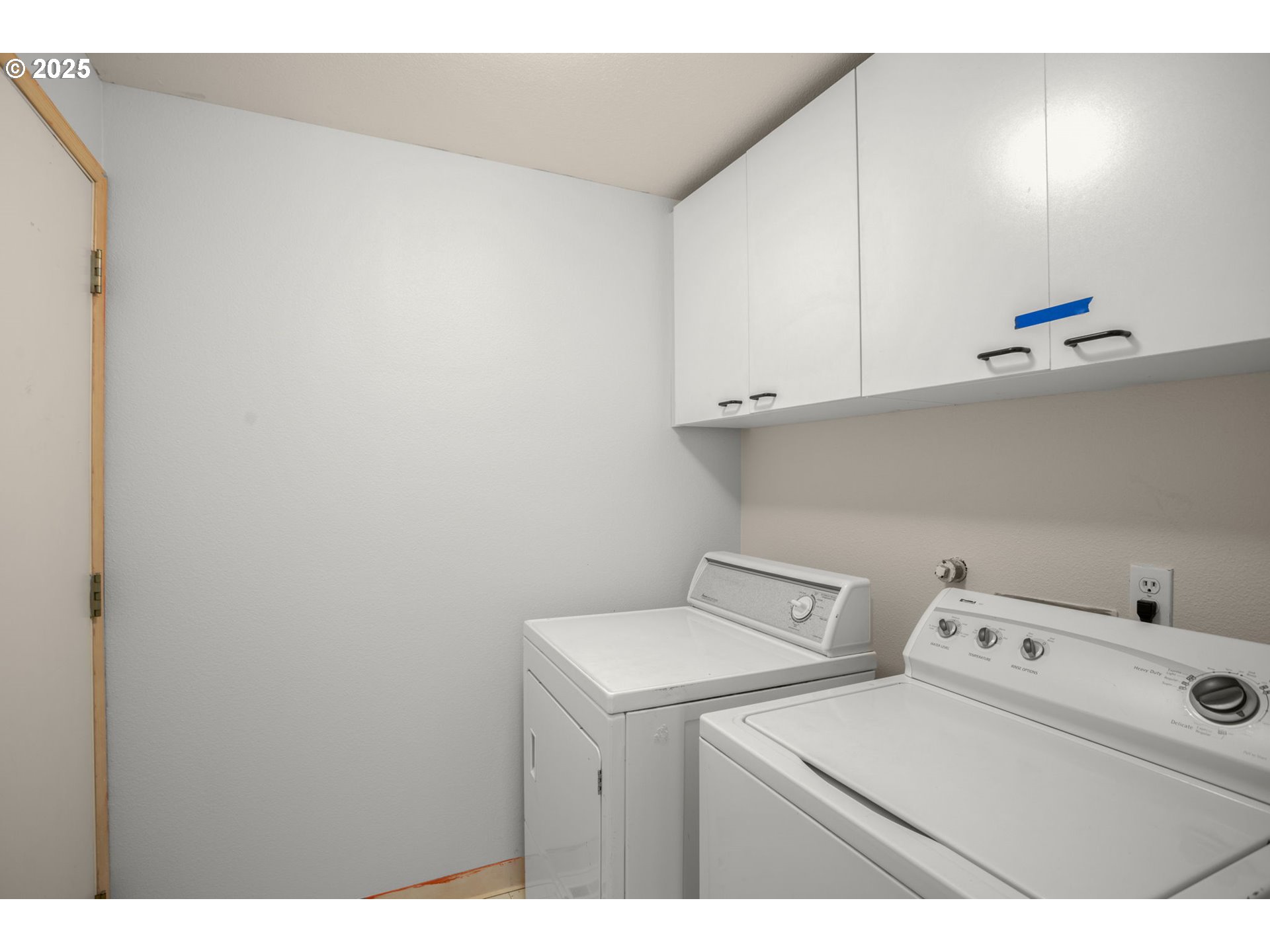 8123 Southwest Hearthside Court Portland, OR 97223 - Photo 18 of 19 a utility room with dryer and washer