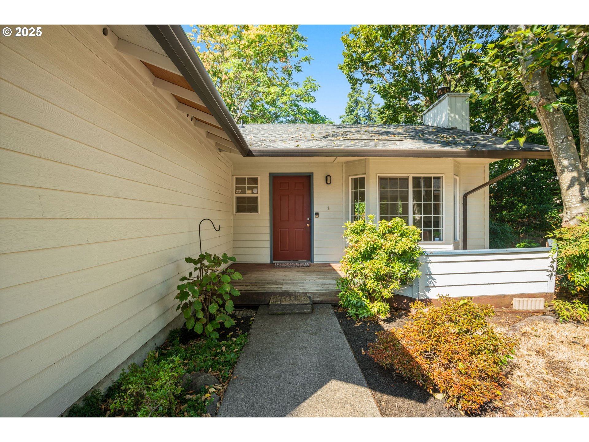 8123 Southwest Hearthside Court Portland, OR 97223 - Photo 2 of 19 a view of a house with a yard