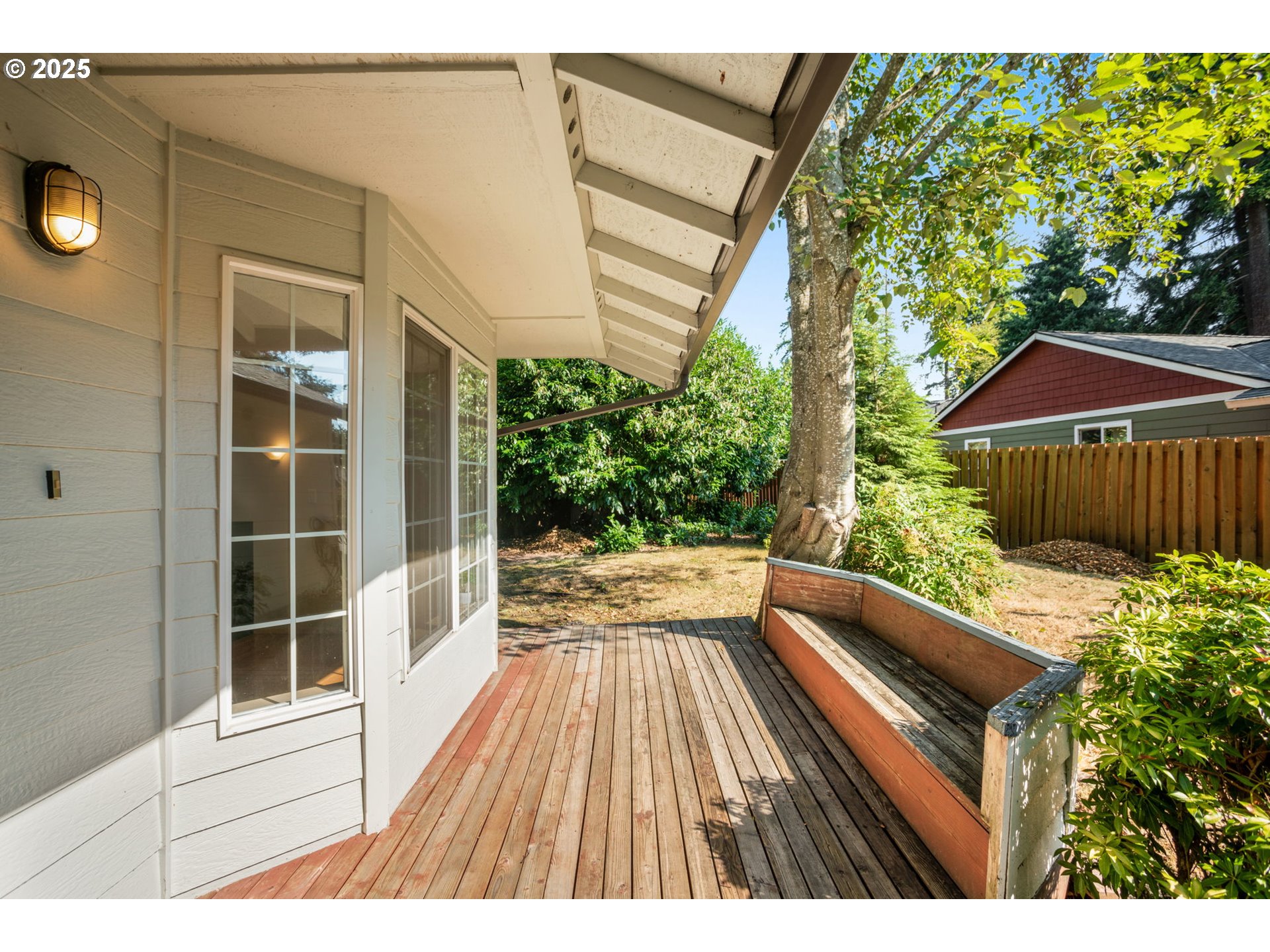 8123 Southwest Hearthside Court Portland, OR 97223 - Photo 3 of 19 a view of balcony with wooden floor and outdoor seating