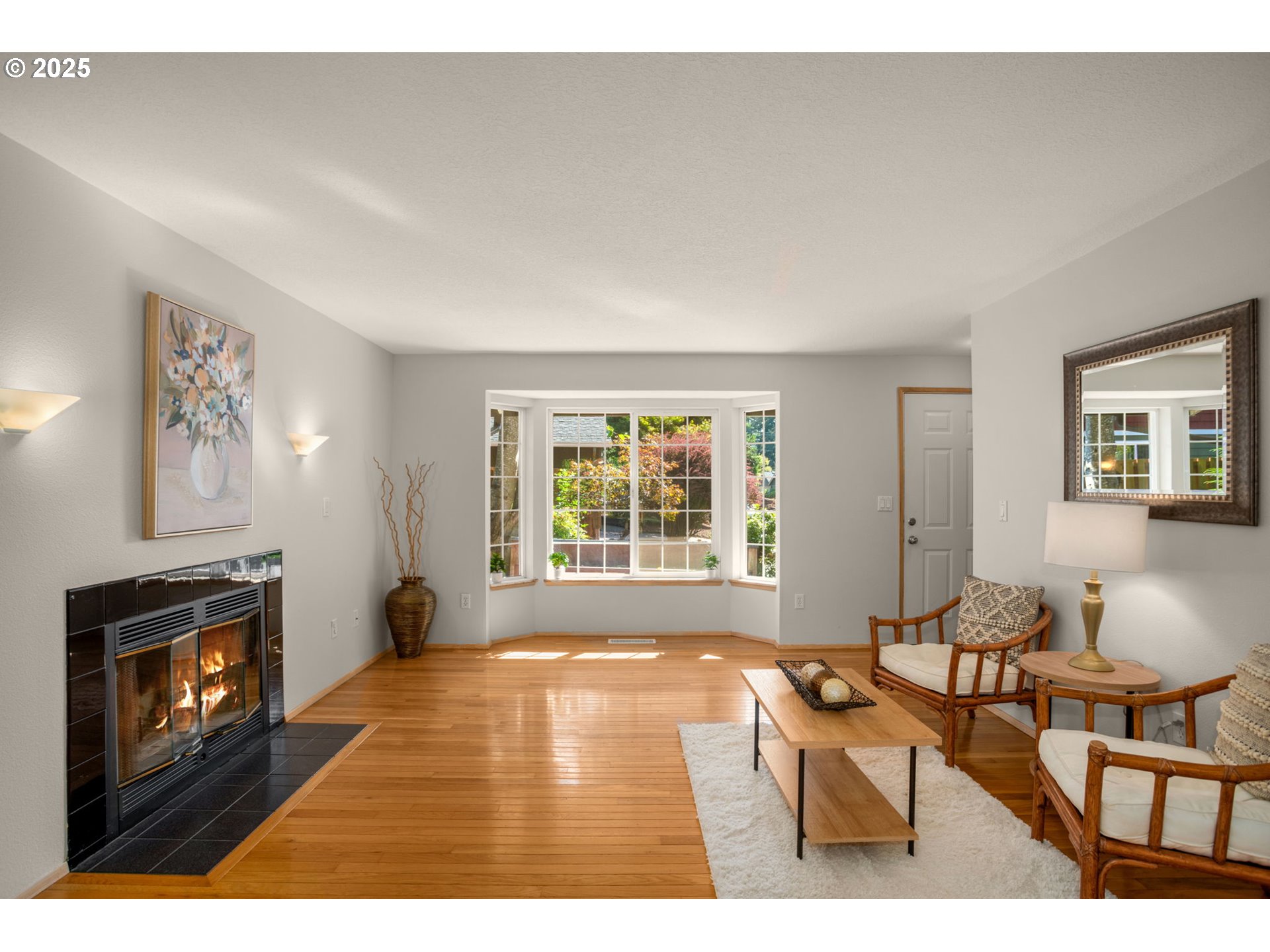 8123 Southwest Hearthside Court Portland, OR 97223 - Photo 6 of 19 a living room with furniture and a fireplace