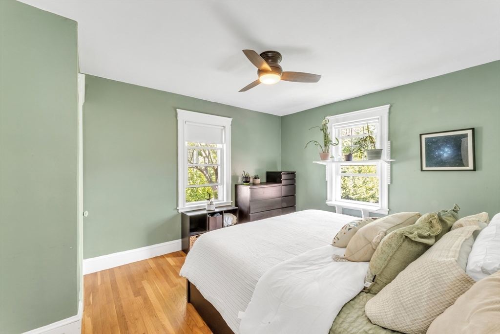 32 Cotuit Street Boston, MA 02132 - Photo 14 of 26 a bedroom with a bed and a window