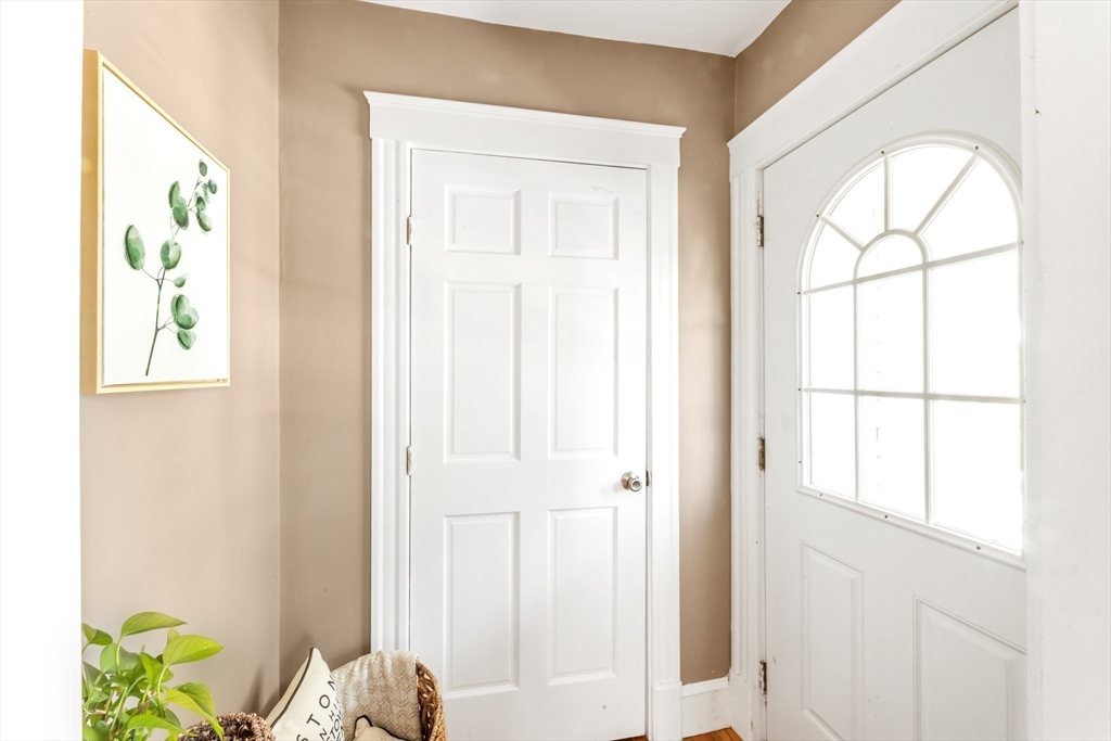 32 Cotuit Street Boston, MA 02132 - Photo 3 of 26 a view of an entryway with wooden floor