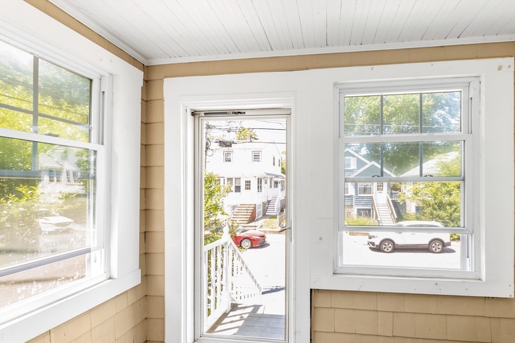 32 Cotuit Street Boston, MA 02132 - Photo 4 of 26 a view of a wooden floor and a window