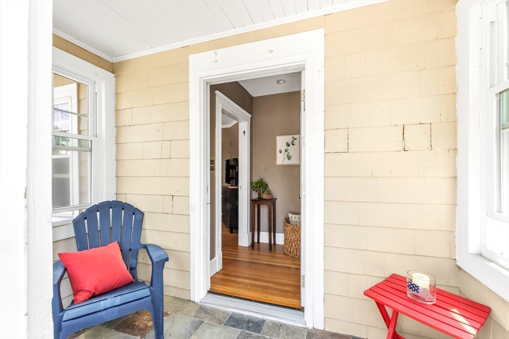 32 Cotuit Street Boston, MA 02132 - Photo 5 of 26 a view of a room with bench and door