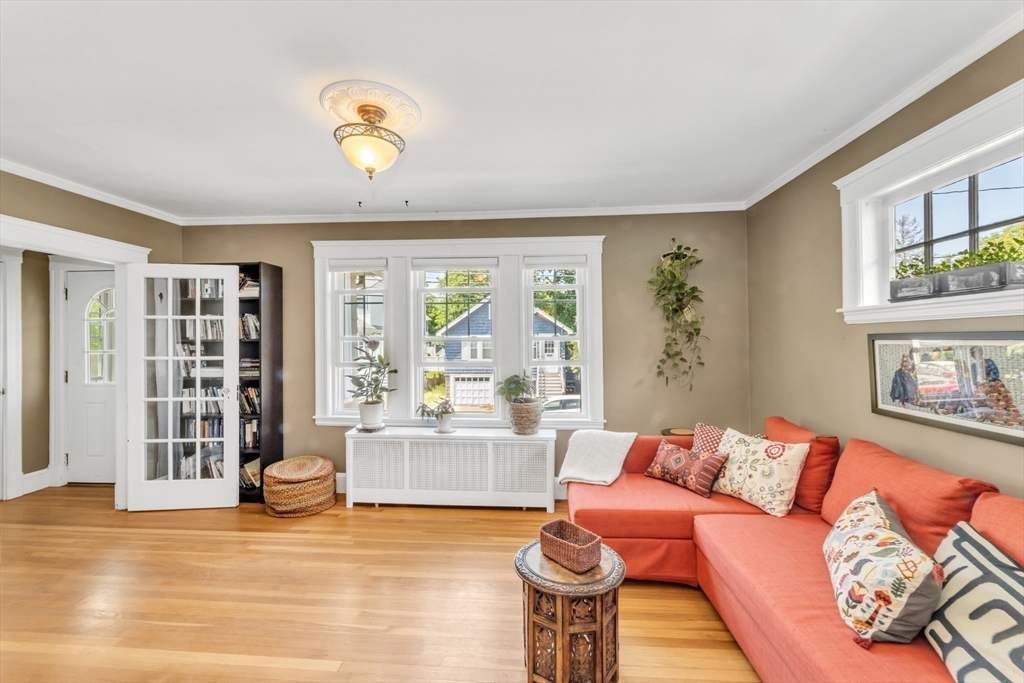 32 Cotuit Street Boston, MA 02132 - Photo 7 of 26 a living room with furniture and a window